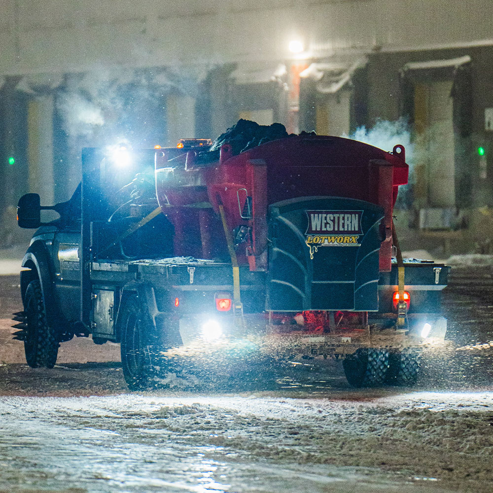 salt and sand spreading on winter roads